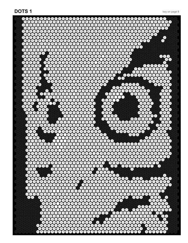 A real page from the book: white circles with small codes on black, the darkest circles already printed